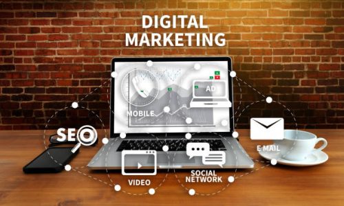 istockphoto-959020654-612×612 DIGITAL MARKETING new startup project MILLENNIALS Business team hands at work with financial reports and a laptop